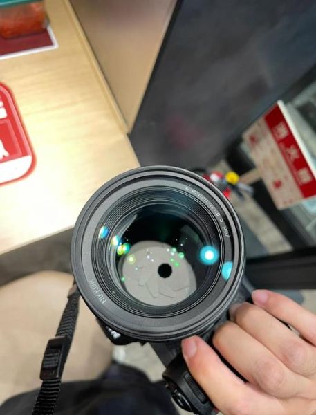 尼康镜头摔坏了怎么办_维修费用大概多少钱-第1张图片-星辰妙记